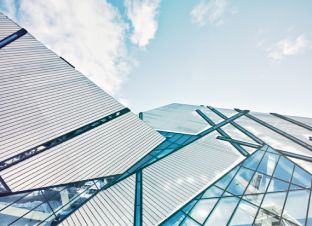 Night sky with the Milky Way over snow-covered mountains
